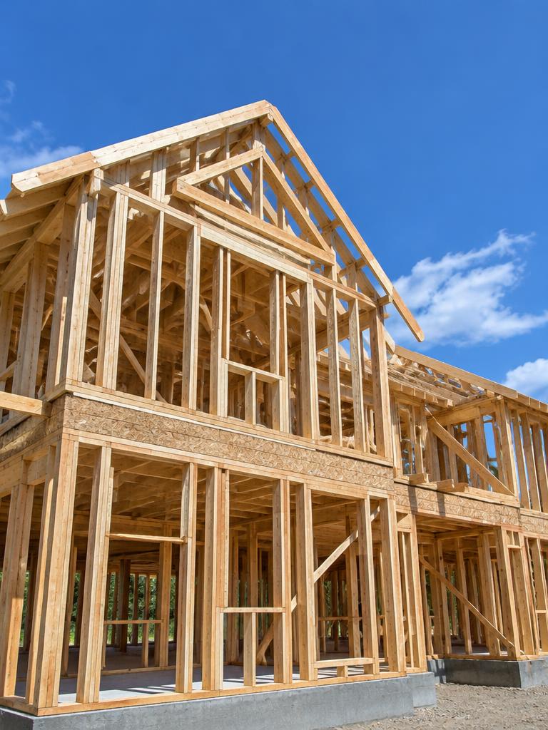 Wood framing of a two-story house under construction